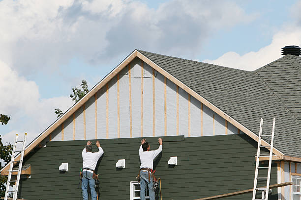 Professional Siding technician working in Oak Ridge, NC